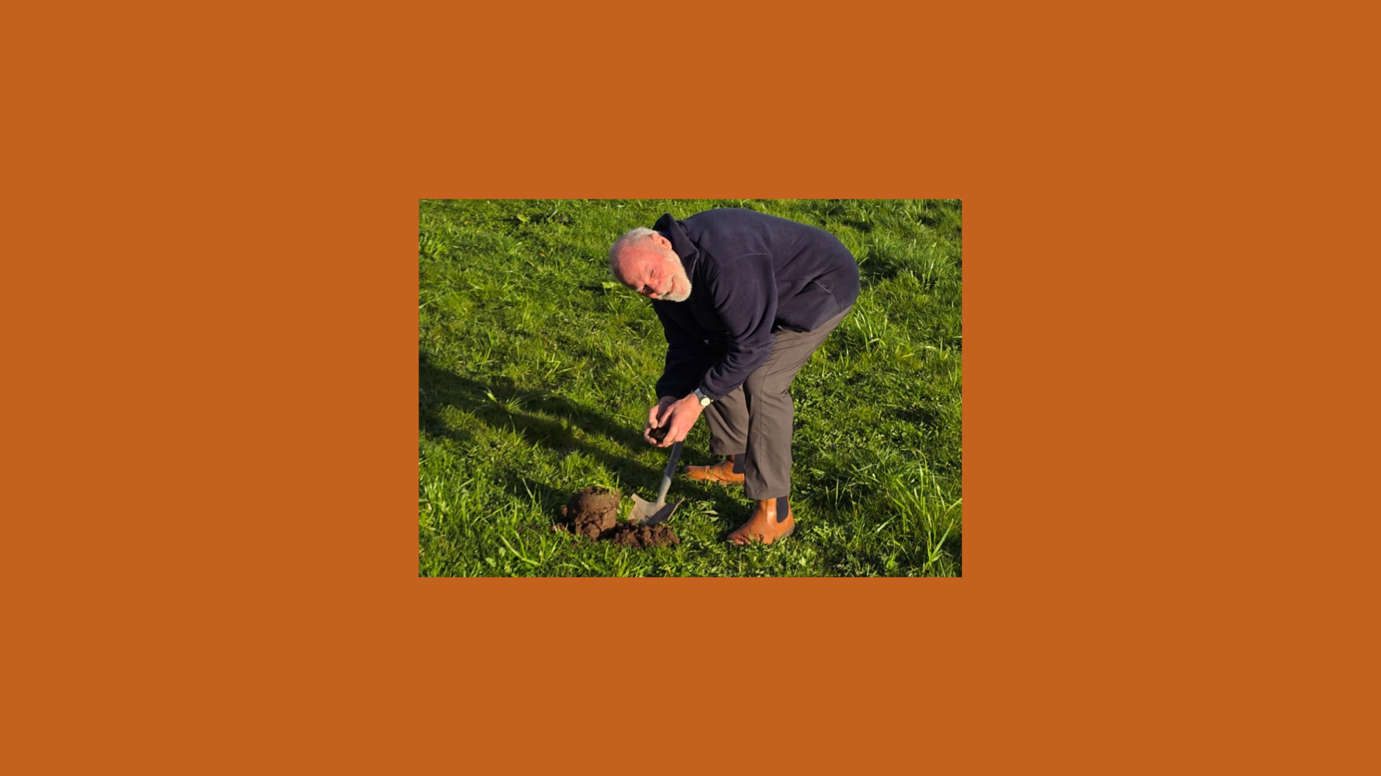 agronomist-john-buchan-digging-a-test-hole-in-a-uk-vineyard